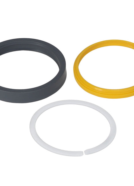 Experience the AGCO Seals Kit - Acp0357040, featuring three vibrant sealing rings in different colors: a sleek black ring, a sunny yellow ring, and a crisp white ring with a small opening.