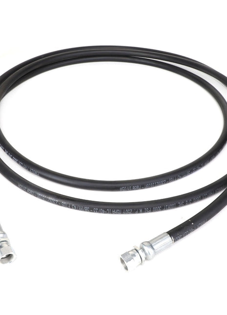 A sleek AGCO hydraulic hose, model Acp0015910, featuring black tubing and metal connectors on both ends, expertly coiled in a precise circular shape.