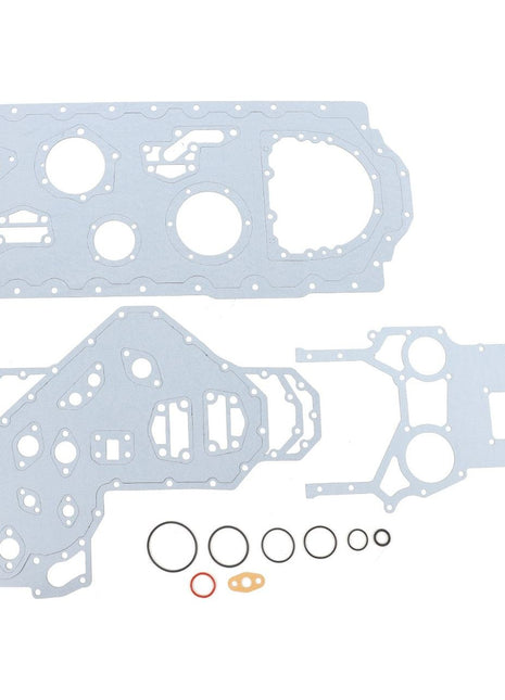 The AGCO | Joint/Gasket Kit - 4224613M91, designed for Valtra, Fendt, and Massey Ferguson tractors, includes two large gasket sheets along with various smaller rubber O-rings and gaskets neatly arranged below them.