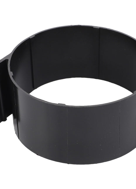 The AGCO | ACCUMULATOR STRAP - AL5215011 by AGCO is a unique black cylindrical plastic ring with a segmented design, featuring a distinctive flat extension on one side. No current product description fully captures its unique structure.