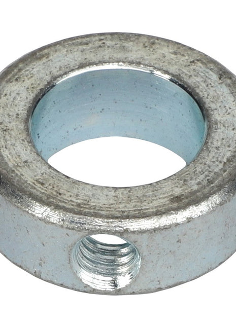 A close-up of the AGCO COLLAR - AG009453, a metal collar featuring a central hole and a side screw hole, typically used for securing positions on shafts. For further details or assistance, please contact our support team.