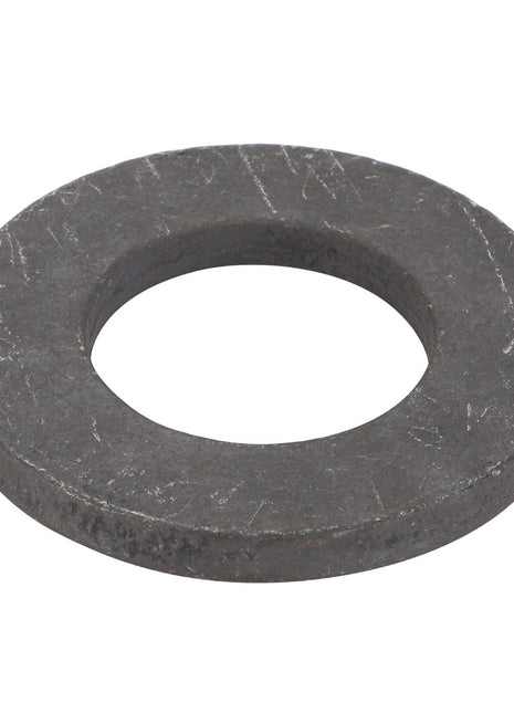The AGCO | DISC - F743300021400, a flat, circular metal washer with a central hole, is commonly used in fastening applications.