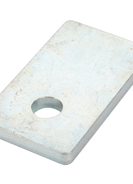 AGCO | Spacer - Acw1742460: Rectangular metallic plate with a single circular hole near one edge, viewed from above. No current product description information is available.