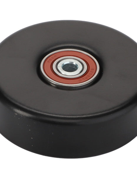 The AGCO | HOLDER - D28751220 idler pulley is crafted from sleek black plastic and boasts a striking red metal bearing in the center.
