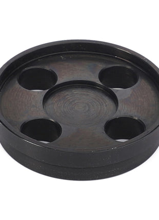 Introducing the AGCO | Spacer - Acw2193260, a black round plastic coaster from AGCO. It features four circular indents designed to hold your drinks securely and stylishly.
