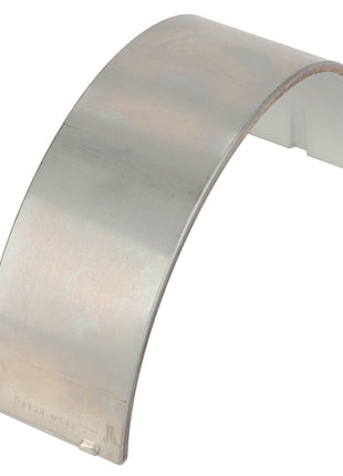 A metallic, curved component from AGCO, known as the Bearing Shell - Acp0357820, features a smooth, reflective surface and a small tab at the base. Currently, there is no comprehensive product description available for this part.