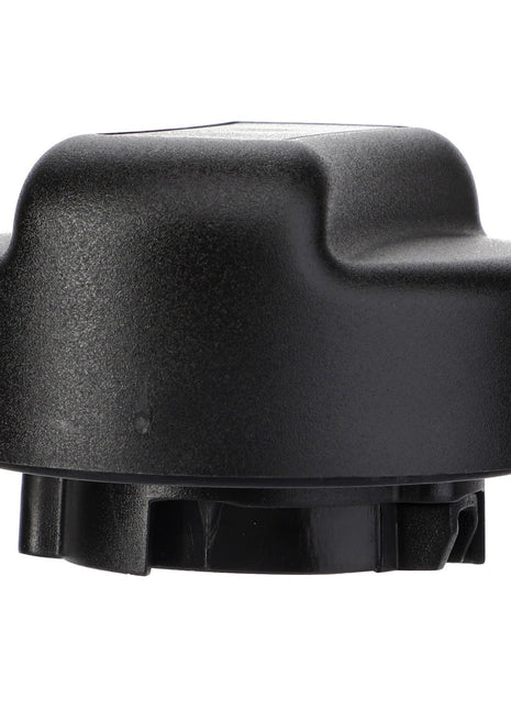 The AGCO | Cap - Acw3517180 from the AGCO brand is a black plastic cap with a molded, slightly elevated top section and a circular base featuring several protruding clips. It is suitable for closing or sealing cylindrical containers or components. No current product description information is available.