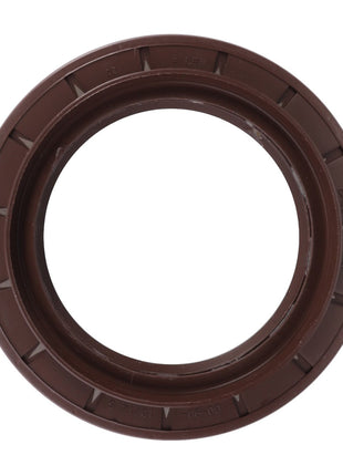 The AGCO Shaft Seal - H524300020121 is a round brown rubber seal with a ridged outer edge, designed specifically for Massey Ferguson machinery to offer protection from contaminants.