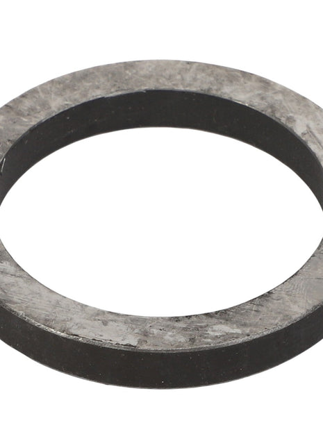 The AGCO | WASHER - E73118 is a flat, circular-shaped metal washer with a hole in the center, photographed on a white background. Currently, no additional product description information is available.
