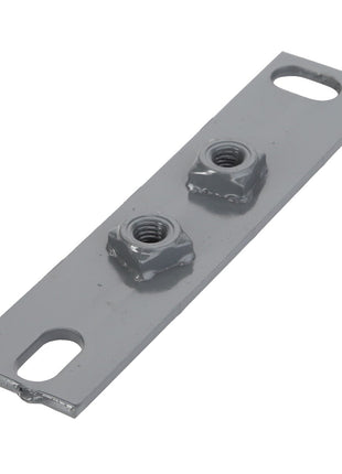 The AGCO | BRACKET - D28788338 is a rectangular metal plate featuring two welded nuts and two elongated holes at each end. The gray plate lies flat against a white background, showcasing its sleek design and emphasizing precision engineering.