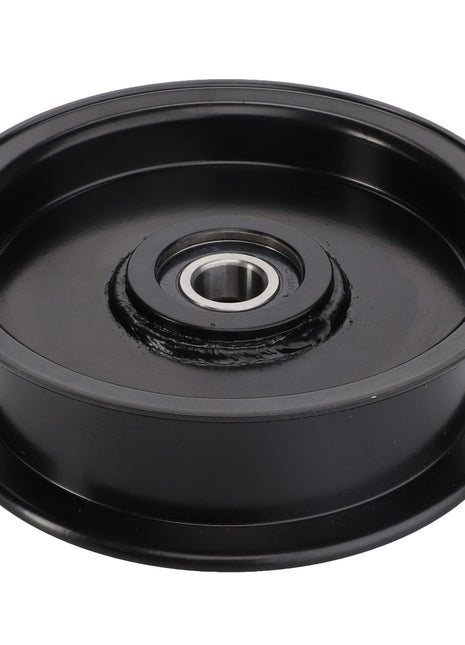 The AGCO TENSIONER PULLEY - ACY1560460 is a black metal pulley wheel with a central bearing, depicted against a white background.