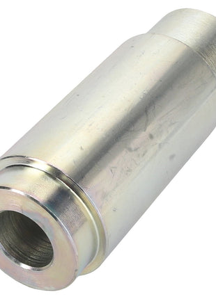 A close-up view of the AGCO | Spacer - Acw0942560, a cylindrical metal object featuring a hollow center, likely a precision-engineered mechanical part or fitting.