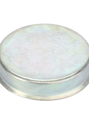 The AGCO Cover - F138314020480 is a metallic, disc-shaped object with a slightly raised rim, featuring a smooth and reflective surface that has been precision machined for prolonged service life.
